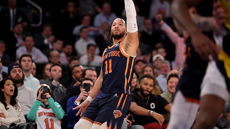 Feb 1, 2024; New York, New York, USA; New York Knicks guard Jalen Brunson (11) watches his three point shot against the Indiana Pacers during the fourth quarter at Madison Square Garden. Mandatory Credit: Brad Penner-USA TODAY Sports