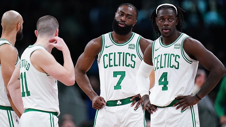 Feb 1, 2024; Boston, Massachusetts, USA; Boston Celtics guard Jrue Holiday (4), guard Jaylen Brown (7), guard Payton Pritchard (11) and guard Derrick White (9) on the court against the Los Angeles Lakers in the second half at TD Garden. Mandatory Credit: David Butler II-USA TODAY Sports