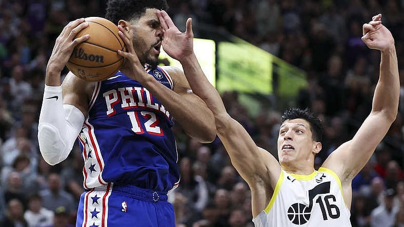 Feb 1, 2024; Salt Lake City, Utah, USA; Philadelphia 76ers forward Tobias Harris (12) is fouled by Utah Jazz forward Simone Fontecchio (16) during the fourth quarter at Delta Center. Mandatory Credit: Rob Gray-USA TODAY Sports