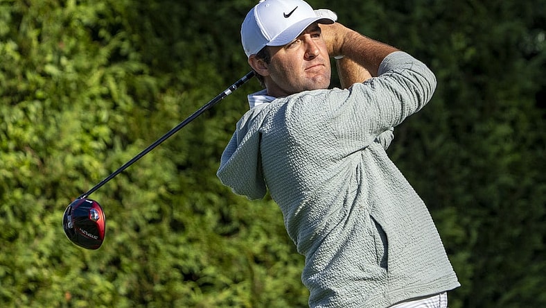 February 2, 2024; Pebble Beach, California, USA; Scottie Scheffler  hits his tee shot on the 16th hole during the second round of the AT&T Pebble Beach Pro-Am golf tournament at Pebble Beach Golf Links. Mandatory Credit: Kyle Terada-USA TODAY Sports