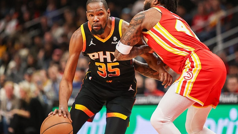Feb 2, 2024; Atlanta, Georgia, USA; Phoenix Suns forward Kevin Durant (35) drives on Atlanta Hawks forward Saddiq Bey (41) in the first quarter at State Farm Arena. Mandatory Credit: Brett Davis-USA TODAY Sports