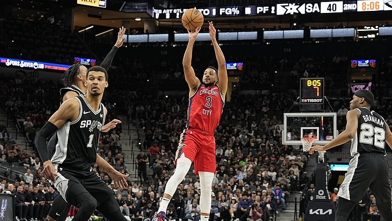 Feb 2, 2024; San Antonio, Texas, USA; New Orleans Pelicans guard CJ McCollum (3) shoots during the first half against the San Antonio Spurs at Frost Bank Center. Mandatory Credit: Scott Wachter-USA TODAY Sports
