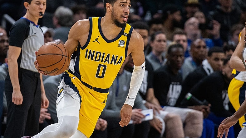 Feb 2, 2024; Indianapolis, Indiana, USA; Indiana Pacers guard Tyrese Haliburton (0) dribbles the ball in the second half against the Sacramento Kings at Gainbridge Fieldhouse. Mandatory Credit: Trevor Ruszkowski-USA TODAY Sports