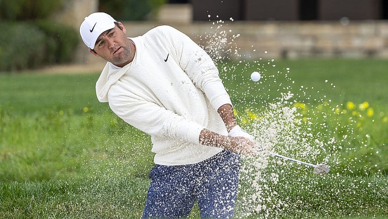 February 3, 2024; Pebble Beach, California, USA; Scottie Scheffler hits his bunker shot on the second hole during the third round of the AT&T Pebble Beach Pro-Am golf tournament at Pebble Beach Golf Links. Mandatory Credit: Kyle Terada-USA TODAY Sports