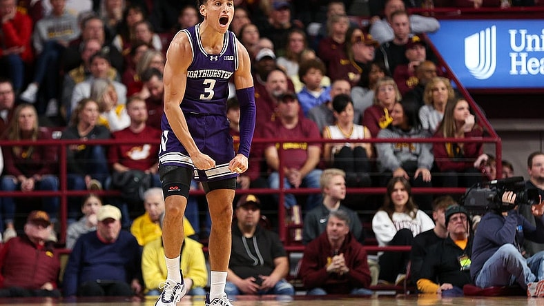 Feb 3, 2024; Minneapolis, Minnesota, USA; Northwestern Wildcats guard Ty Berry (3) celebrates his three-point basket against the Minnesota Golden Gophers during the first half at Williams Arena. Mandatory Credit: Matt Krohn-USA TODAY Sports