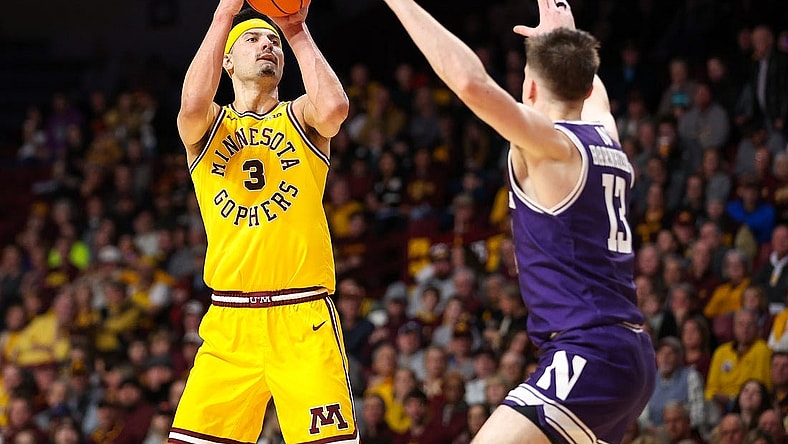Feb 3, 2024; Minneapolis, Minnesota, USA; Minnesota Golden Gophers forward Dawson Garcia (3) shoots as Northwestern Wildcats guard Brooks Barnhizer (13) defends during the first half at Williams Arena. Mandatory Credit: Matt Krohn-USA TODAY Sports