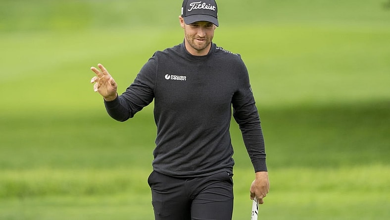 February 3, 2024; Pebble Beach, California, USA; Wyndham Clark acknowledges the crowd after making his putt on the second hole during the third round of the AT&T Pebble Beach Pro-Am golf tournament at Pebble Beach Golf Links. Mandatory Credit: Kyle Terada-USA TODAY Sports