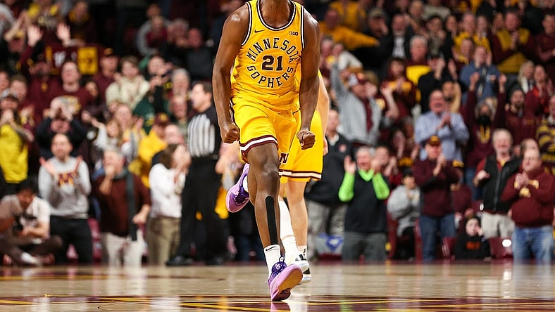 Feb 3, 2024; Minneapolis, Minnesota, USA; Minnesota Golden Gophers forward Pharrel Payne (21) celebrates his dunk against the Northwestern Wildcats during overtime at Williams Arena. Mandatory Credit: Matt Krohn-USA TODAY Sports