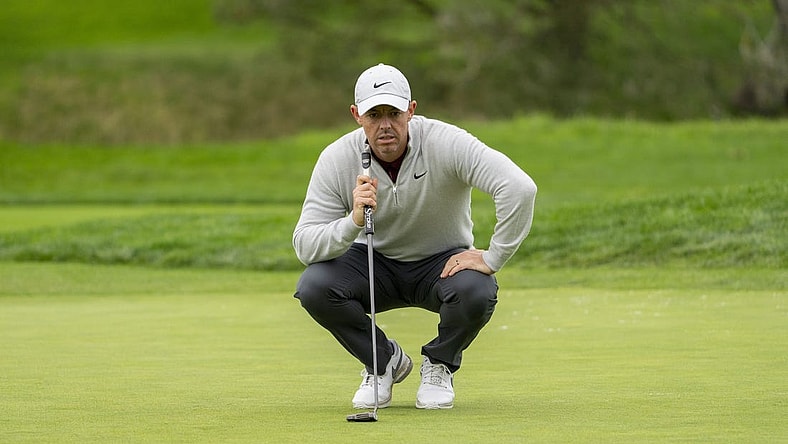 February 3, 2024; Pebble Beach, California, USA; Rory McIlroy lines up his putt on the second hole during the third round of the AT&T Pebble Beach Pro-Am golf tournament at Pebble Beach Golf Links. Mandatory Credit: Kyle Terada-USA TODAY Sports