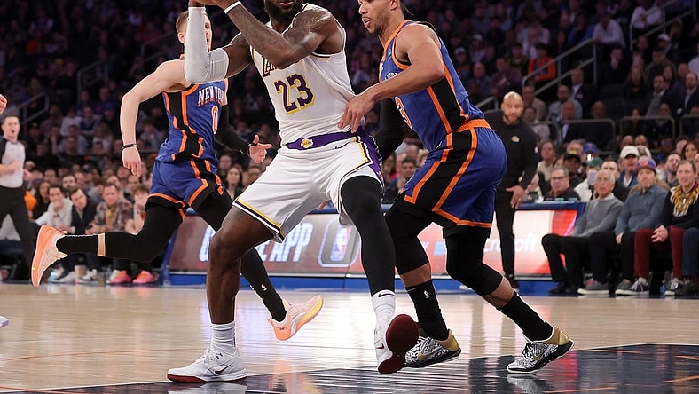 Feb 3, 2024; New York, New York, USA; Los Angeles Lakers forward LeBron James (23) drives to the basket against New York Knicks guard Josh Hart (3) during the first quarter at Madison Square Garden. Mandatory Credit: Brad Penner-USA TODAY Sports