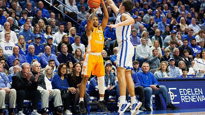 Feb 3, 2024; Lexington, Kentucky, USA; Tennessee Volunteers guard Zakai Zeigler (5) makes a three point basket during the first half against the Kentucky Wildcats at Rupp Arena at Central Bank Center. Mandatory Credit: Jordan Prather-USA TODAY Sports