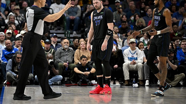 Feb 3, 2024; Dallas, Texas, USA; Dallas Mavericks guard Luka Doncic (77) reacts to being called for a foul by referee Curtis Blair (74) during the second quarter against the Milwaukee Bucks at the American Airlines Center. Mandatory Credit: Jerome Miron-USA TODAY Sports