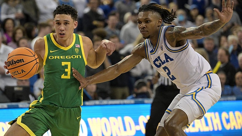 Feb 3, 2024; Los Angeles, California, USA; Oregon Ducks guard Jackson Shelstad (3) drives past UCLA Bruins guard Dylan Andrews (2) in the second half at Pauley Pavilion presented by Wescom. Mandatory Credit: Jayne Kamin-Oncea-USA TODAY Sports