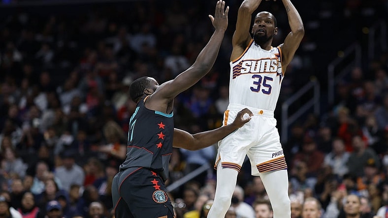 Feb 4, 2024; Washington, District of Columbia, USA; Phoenix Suns forward Kevin Durant (35) shoots the ball over Washington Wizards guard Bilal Coulibaly (0) in the first half at Capital One Arena. Mandatory Credit: Geoff Burke-USA TODAY Sports
