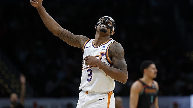 Feb 4, 2024; Washington, District of Columbia, USA; Phoenix Suns guard Bradley Beal (3) celebrates after a three point field goal against the Washington Wizards in the second half at Capital One Arena. Mandatory Credit: Geoff Burke-USA TODAY Sports