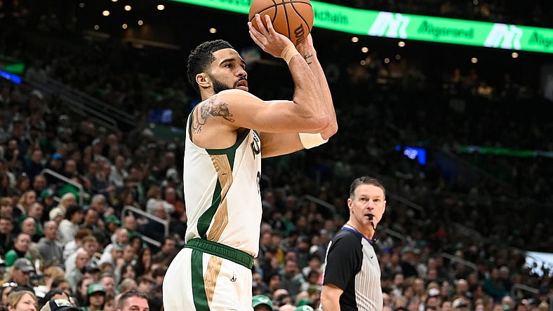 Feb 4, 2024; Boston, Massachusetts, USA; Boston Celtics forward Jayson Tatum (0)  shoots the ball against the Memphis Grizzlies during the first half at TD Garden. Mandatory Credit: Eric Canha-USA TODAY Sports
