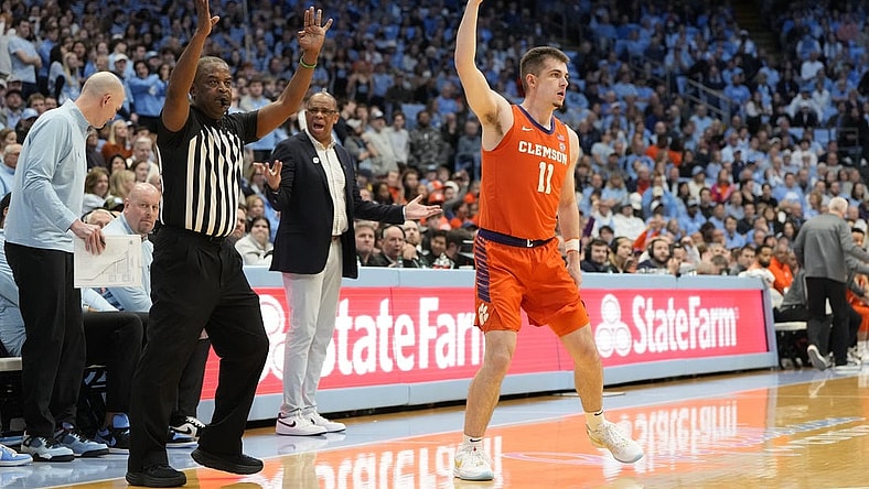 Feb 6, 2024; Chapel Hill, North Carolina, USA;  Clemson Tigers guard Joseph Girard III (11) reacts after hitting a three point shot in the first half at Dean E. Smith Center. Mandatory Credit: Bob Donnan-USA TODAY Sports