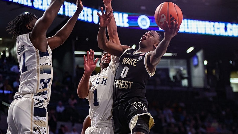 Feb 6, 2024; Atlanta, Georgia, USA; Wake Forest Demon Deacons guard Kevin Miller (0) shoots against the Georgia Tech Yellow Jackets in the first half at McCamish Pavilion. Mandatory Credit: Brett Davis-USA TODAY Sports