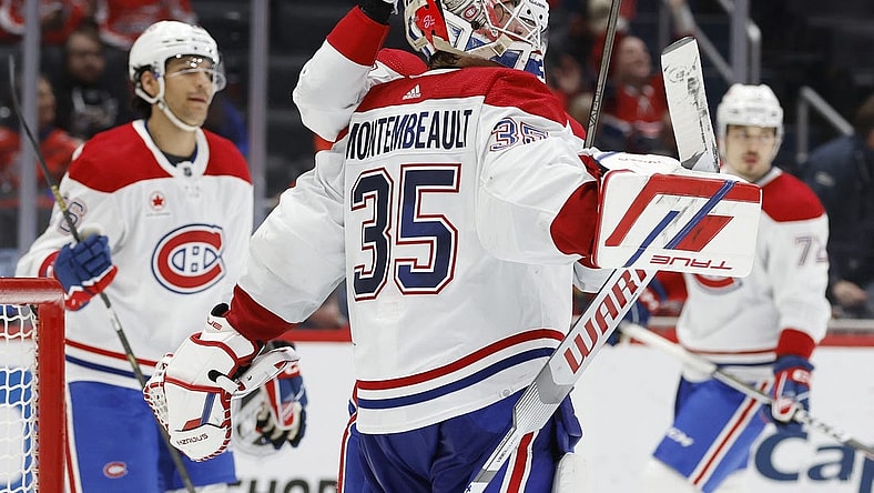 Feb 6, 2024; Washington, District of Columbia, USA; Montreal Canadiens goaltender Sam Montembeault (35) celebrates with teammates after their game against the Washington Capitals at Capital One Arena. Mandatory Credit: Geoff Burke-USA TODAY Sports