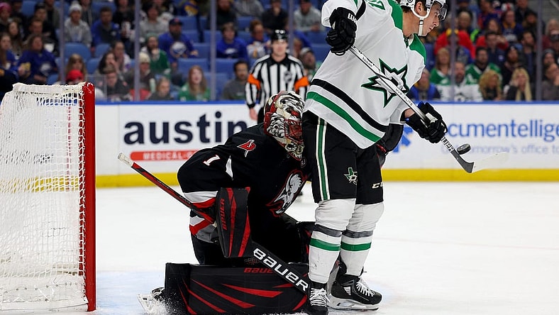Feb 6, 2024; Buffalo, New York, USA;  Dallas Stars left wing Mason Marchment (27) deflects a shot on Buffalo Sabres goaltender Ukko-Pekka Luukkonen (1) during the third period at KeyBank Center. Mandatory Credit: Timothy T. Ludwig-USA TODAY Sports