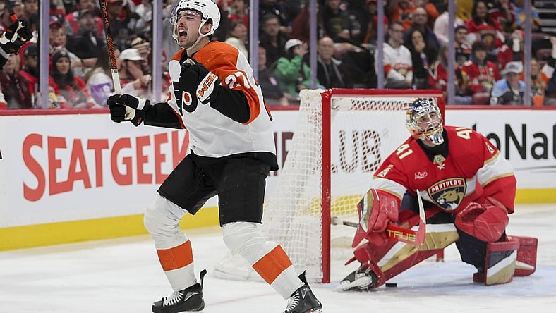 Feb 6, 2024; Sunrise, Florida, USA; Philadelphia Flyers left wing Noah Cates (27) celebrates after scoring against Florida Panthers goaltender Anthony Stolarz (41) during the third period at Amerant Bank Arena. Mandatory Credit: Sam Navarro-USA TODAY Sports