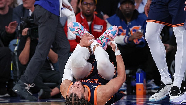 Feb 6, 2024; New York, New York, USA; New York Knicks guard Jalen Brunson (11) reacts after being injured during the second half against the Memphis Grizzlies at Madison Square Garden. Mandatory Credit: Vincent Carchietta-USA TODAY Sports