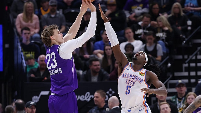 Feb 6, 2024; Salt Lake City, Utah, USA; Utah Jazz forward Lauri Markkanen (23) shoots over Oklahoma City Thunder guard Luguentz Dort (5) during the second quarter at Delta Center. Mandatory Credit: Rob Gray-USA TODAY Sports