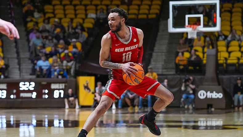 Feb 6, 2024; Laramie, Wyoming, USA; New Mexico Lobos guard Jaelen House (10) looks to pass against the Wyoming Cowboys during the second half at Arena-Auditorium. Mandatory Credit: Troy Babbitt-USA TODAY Sports