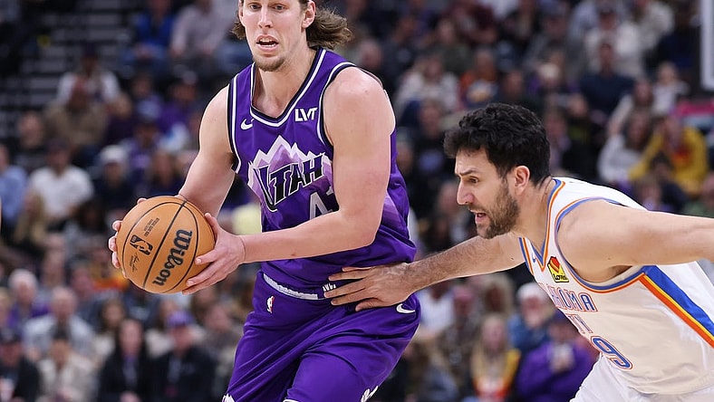 Feb 6, 2024; Salt Lake City, Utah, USA; Utah Jazz forward Kelly Olynyk (41) moves the ball against Oklahoma City Thunder guard Vasilije Micic (29) during the fourth quarter at Delta Center. Mandatory Credit: Rob Gray-USA TODAY Sports