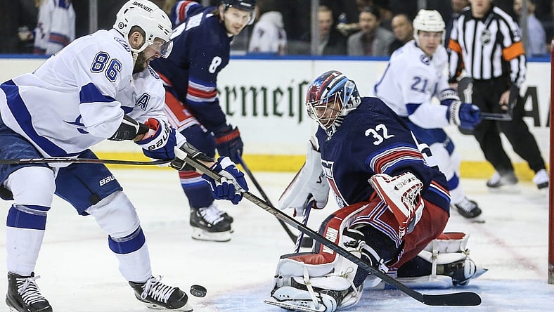 Feb 7, 2024; New York, New York, USA; New York Rangers goaltender Jonathan Quick (32) defends the net against Tampa Bay Lightning right wing Nikita Kucherov (86) in the first period at Madison Square Garden. Mandatory Credit: Wendell Cruz-USA TODAY Sports