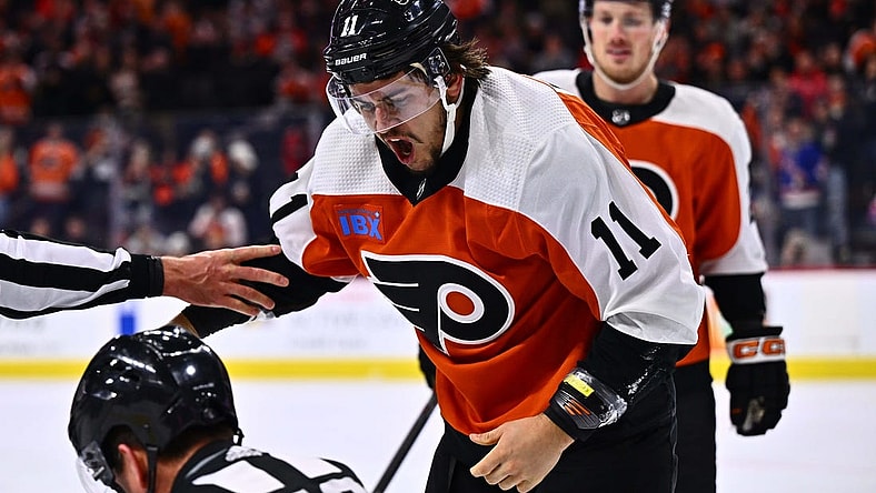 Feb 8, 2024; Philadelphia, Pennsylvania, USA; Philadelphia Flyers right wing Travis Konecny (11) reacts after a fight against Winnipeg Jets defenseman Neal Pionk (4) in the first period at Wells Fargo Center. Mandatory Credit: Kyle Ross-USA TODAY Sports