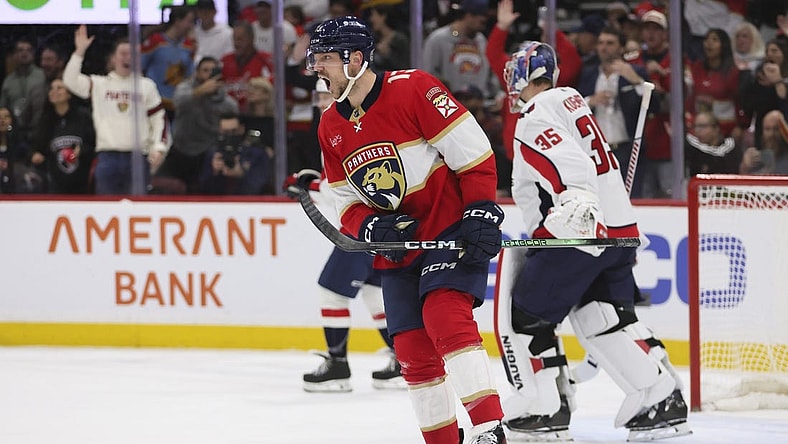 Feb 8, 2024; Sunrise, Florida, USA; Florida Panthers center Sam Reinhart (13) celebrates after scoring against the Washington Capitals during the second period at Amerant Bank Arena. Mandatory Credit: Sam Navarro-USA TODAY Sports
