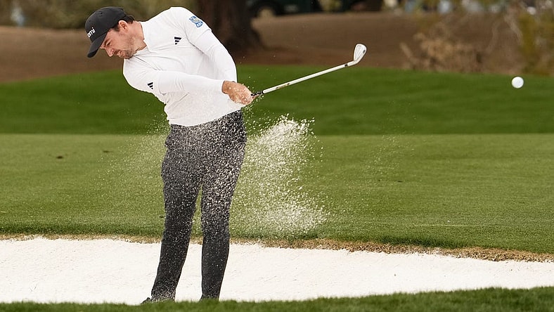 Nick Taylor plays his second from a bunker shot on the second hole during Round 2 at the WM Phoenix Open at TPC Scottsdale on Feb. 9, 2024.