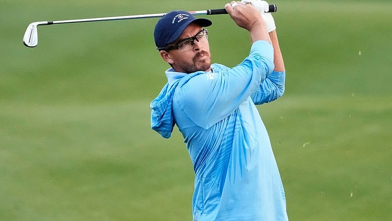 Feb 9, 2024; Scottsdale, AZ, USA; Rickie Fowler plays his second shot on the first hole during Round 2 at the WM Phoenix Open at TPC Scottsdale.