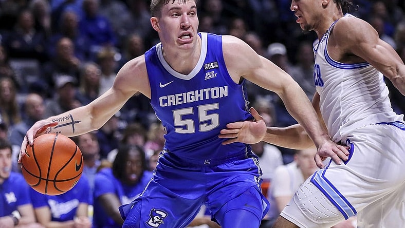 Feb 10, 2024; Cincinnati, Ohio, USA; Creighton Bluejays guard Baylor Scheierman (55) dribbles against Xavier Musketeers guard Desmond Claude (1) in the first half at Cintas Center. Mandatory Credit: Katie Stratman-USA TODAY Sports