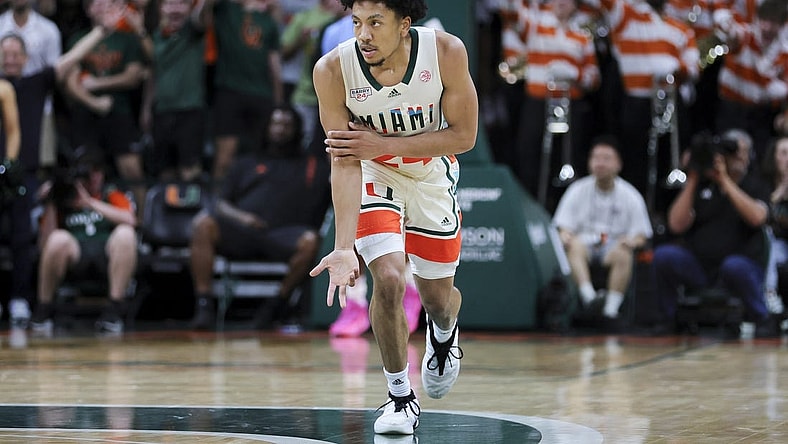 Feb 10, 2024; Coral Gables, Florida, USA; Miami Hurricanes guard Nijel Pack (24) reacts after scoring against the North Carolina Tar Heels during the first half at Watsco Center. Mandatory Credit: Sam Navarro-USA TODAY Sports