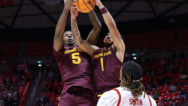 Feb 10, 2024; Salt Lake City, Utah, USA; Arizona State Sun Devils guard Jamiya Neal (5) and guard Frankie Collins (1) battle for a rebound against the Utah Utes during the second half at Jon M. Huntsman Center. Mandatory Credit: Rob Gray-USA TODAY Sports