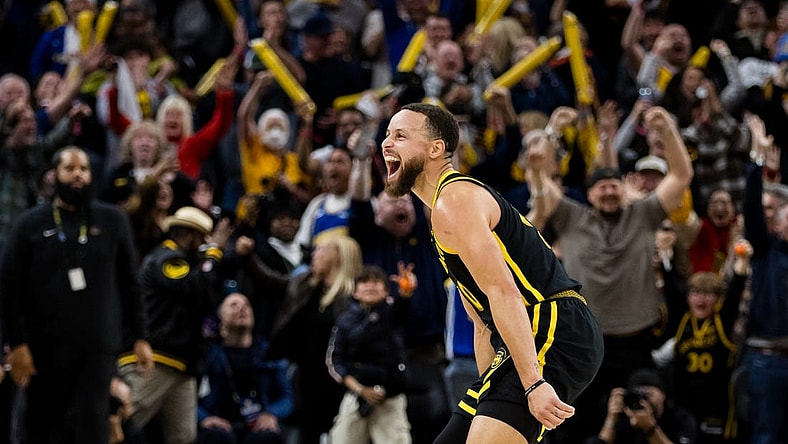 Feb 10, 2024; San Francisco, California, USA; Golden State Warriors guard Stephen Curry (30) reacts after hitting a three-ppont shot in the last second against the Phoenix Suns during the second half at Chase Center. Mandatory Credit: John Hefti-USA TODAY Sports