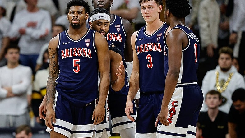 Feb 10, 2024; Boulder, Colorado, USA; Arizona Wildcats guard KJ Lewis (5) and guard Kylan Boswell (4) and center Oumar Ballo (11) and guard Pelle Larsson (3) and guard Jaden Bradley (0) in the first half against the Colorado Buffaloes at CU Events Center. Mandatory Credit: Isaiah J. Downing-USA TODAY Sports