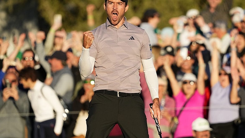 Feb 11, 2024; Scottsdale, AZ, USA; Nick Taylor reacts after making his birdie putt to force a playoff with Charley Hoffman
on the 18th hole during the final round of the WM Phoenix Open at TPC Scottsdale. Mandatory Credit: Rob Schumacher-Arizona Republic