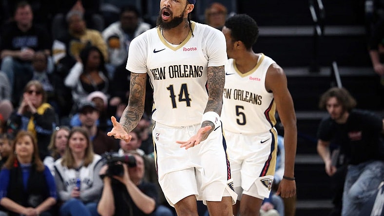 Feb 12, 2024; Memphis, Tennessee, USA; New Orleans Pelicans forward Brandon Ingram (14) reacts during the first half against the Memphis Grizzlies at FedExForum. Mandatory Credit: Petre Thomas-USA TODAY Sports
