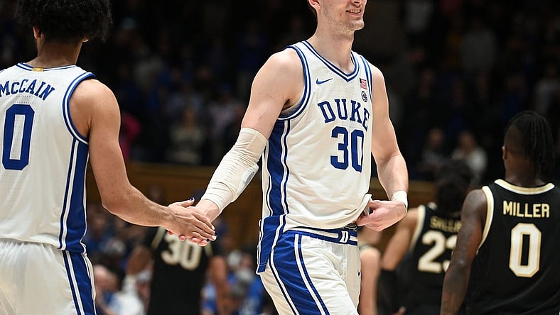 Feb 12, 2024; Durham, North Carolina, USA;  Duke Blue Devils center Kyle Filipowski (30) reacts after beating the Wake Forest Deamon Deacons at Cameron Indoor Stadium. The Blue Devils won 77-69. Mandatory Credit: Rob Kinnan-USA TODAY Sports