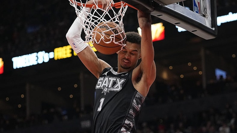 Feb 12, 2024; Toronto, Ontario, CAN; San Antonio Spurs center Victor Wembanyama (1) dunks the ball against the Toronto Raptors during the second half at Scotiabank Arena. Mandatory Credit: John E. Sokolowski-USA TODAY Sports
