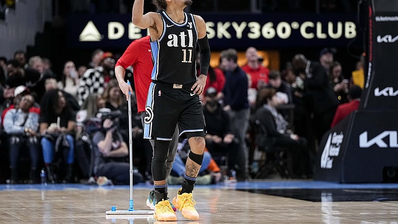 Feb 12, 2024; Atlanta, Georgia, USA; Atlanta Hawks guard Trae Young (11) gestures after being called for a technical foul against the Chicago Bulls during the second half at State Farm Arena. Mandatory Credit: Dale Zanine-USA TODAY Sports