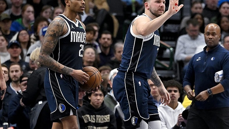 Feb 12, 2024; Dallas, Texas, USA; Dallas Mavericks guard Luka Doncic (77) shows blood on his hand after he is hit in the face by Washington Wizards forward Corey Kispert (not pictured) during the second half at the American Airlines Center. Mandatory Credit: Jerome Miron-USA TODAY Sports