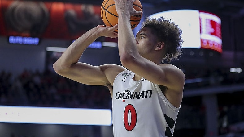 Feb 13, 2024; Cincinnati, Ohio, USA; Cincinnati Bearcats guard Dan Skillings Jr. (0) shoots against the Iowa State Cyclones in the second half at Fifth Third Arena. Mandatory Credit: Katie Stratman-USA TODAY Sports