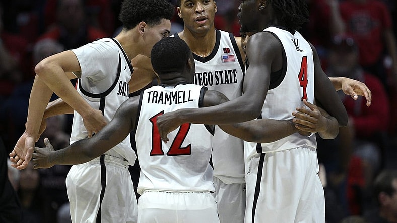 Feb 13, 2024; San Diego, California, USA; San Diego State Aztecs forward Jaedon LeDee (13) huddles with teammates during the second half against the Colorado State Rams at Viejas Arena. Mandatory Credit: Orlando Ramirez-USA TODAY Sports