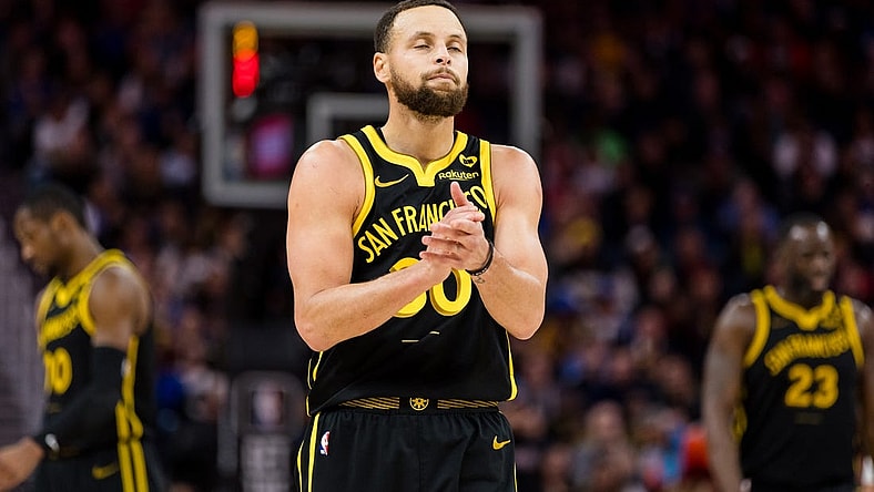 Feb 14, 2024; San Francisco, California, USA; Golden State Warriors guard Stephen Curry (30) reacts after missing a shot against the LA Clippers during the second half at Chase Center. Mandatory Credit: John Hefti-USA TODAY Sports
