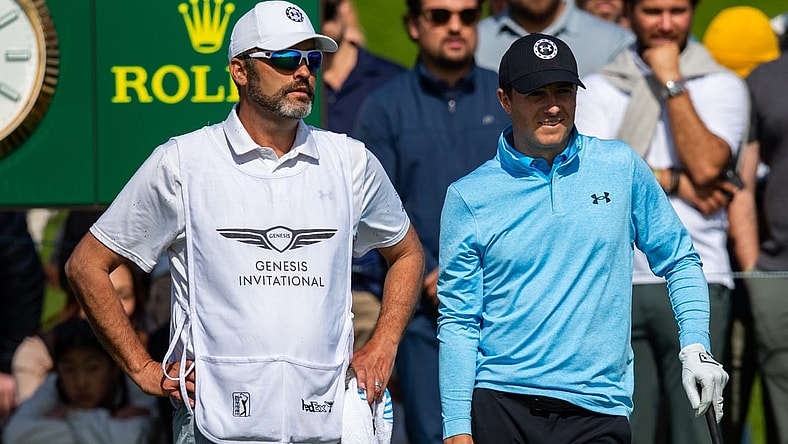 Feb 15, 2024; Pacific Palisades, California, USA; Jordan Spieth and his caddie on the tenth hole during the first round of The Genesis Invitational golf tournament. Mandatory Credit: Jason Parkhurst-USA TODAY Sports