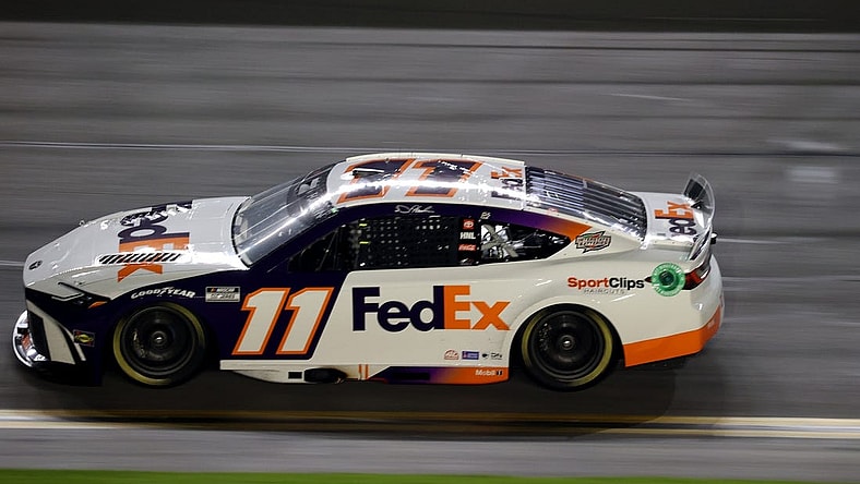 Feb 15, 2024; Daytona Beach, Florida, USA; NASCAR Cup Series driver Denny Hamlin (11) during the Bluegreen Vacations Duel 2 at Daytona International Speedway. Mandatory Credit: Peter Casey-USA TODAY Sports